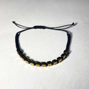 KNITTED BRACELET WITH STEEL GOLD STONES